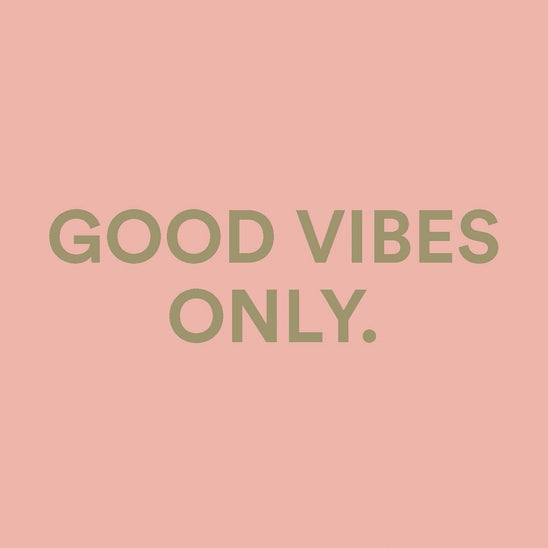 Good Vibes Only” minimalist quote graphic in soft blush pink, representing the Good Vibes in a Bottle perfume by The Heart Company. Clean lifestyle branding for a vegan eau de parfum with a fruity, floral, sweet gourmand scent and positive mood-boosting message