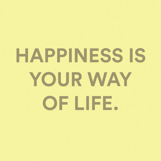 Lifestyle brand message reading ‘Happiness is your way of life’ on a soft yellow background, representing the Happiness in a Bottle perfume brand philosophy by The Heart Company.