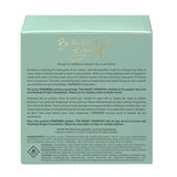 Back of Kindness in a Bottle perfume box by The Heart Company showing product description, fragrance story, ingredients, safety warnings, and “Made in USA” label on a mint green package for a vegan, cruelty-free unisex fragrance
