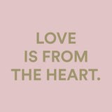 Love is from the heart quote graphic for Love in a Bottle vegan perfume by The Heart Company, expressing emotional fragrance branding and romantic, feel-good scent identity